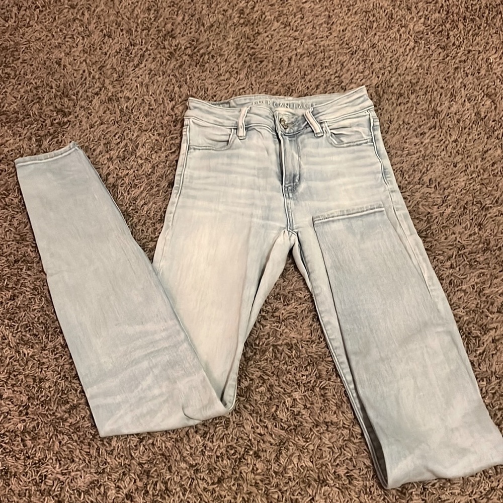 American Eagle light wash blue jeans high waisted skinny soft stretch US 0 xlong